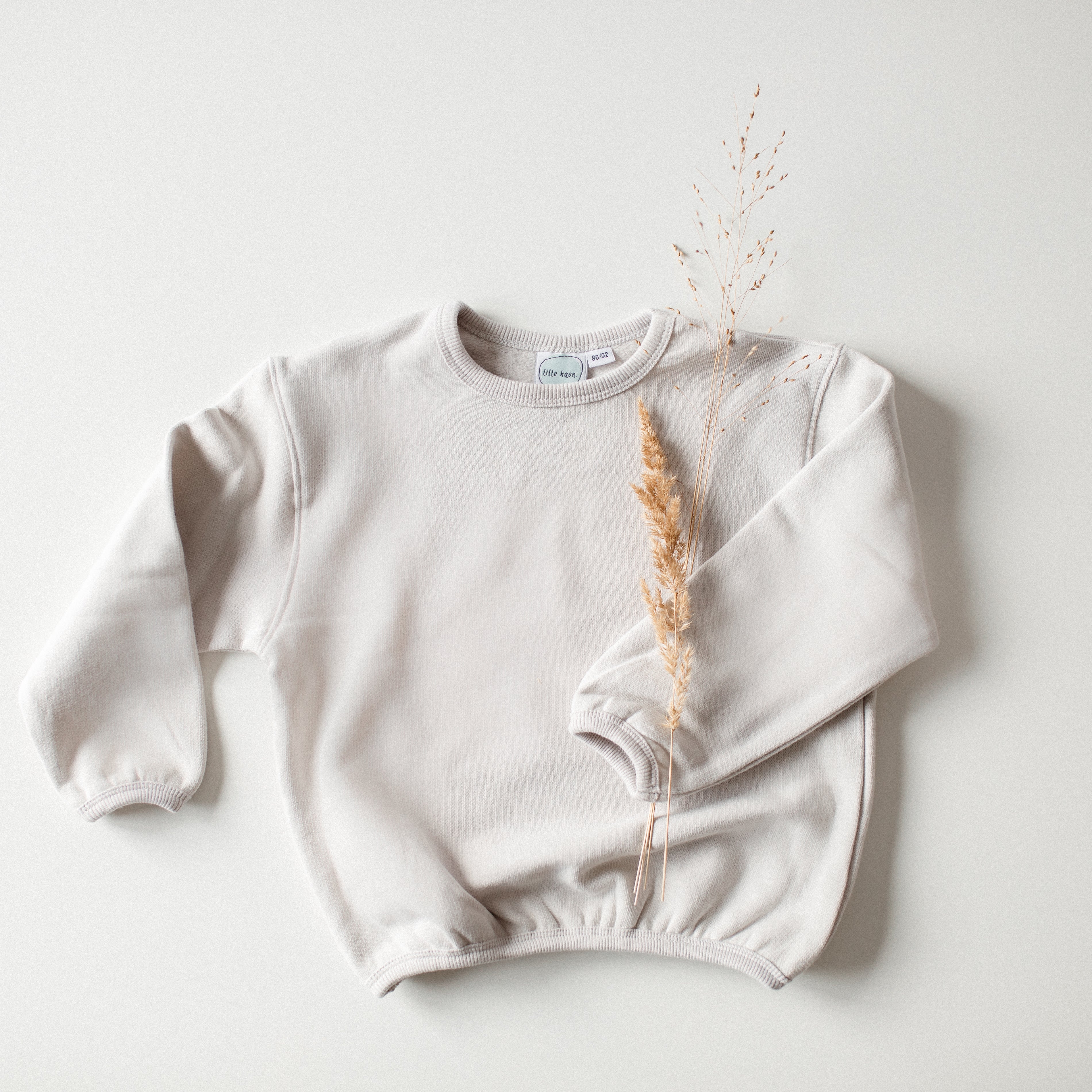 Baby Oversized Sweathirt aus 100% Bio Baumwolle mit Raffung